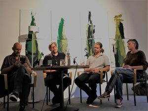 Podiumsgespräch nach einer Lyriklesung mit Esad Babacic und Anja Golob: Von links nach rechts: Esad Babacic, Dominik Srienc (RMI, Moderation), Daniel Terkl (hochroth Verlag), Anja Golob