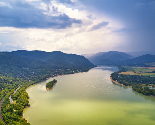 Summer rain and stormy weather. Danube river valley panorama.