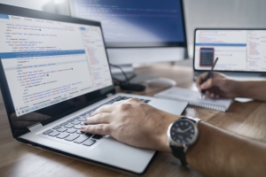 Man in front of Laptop